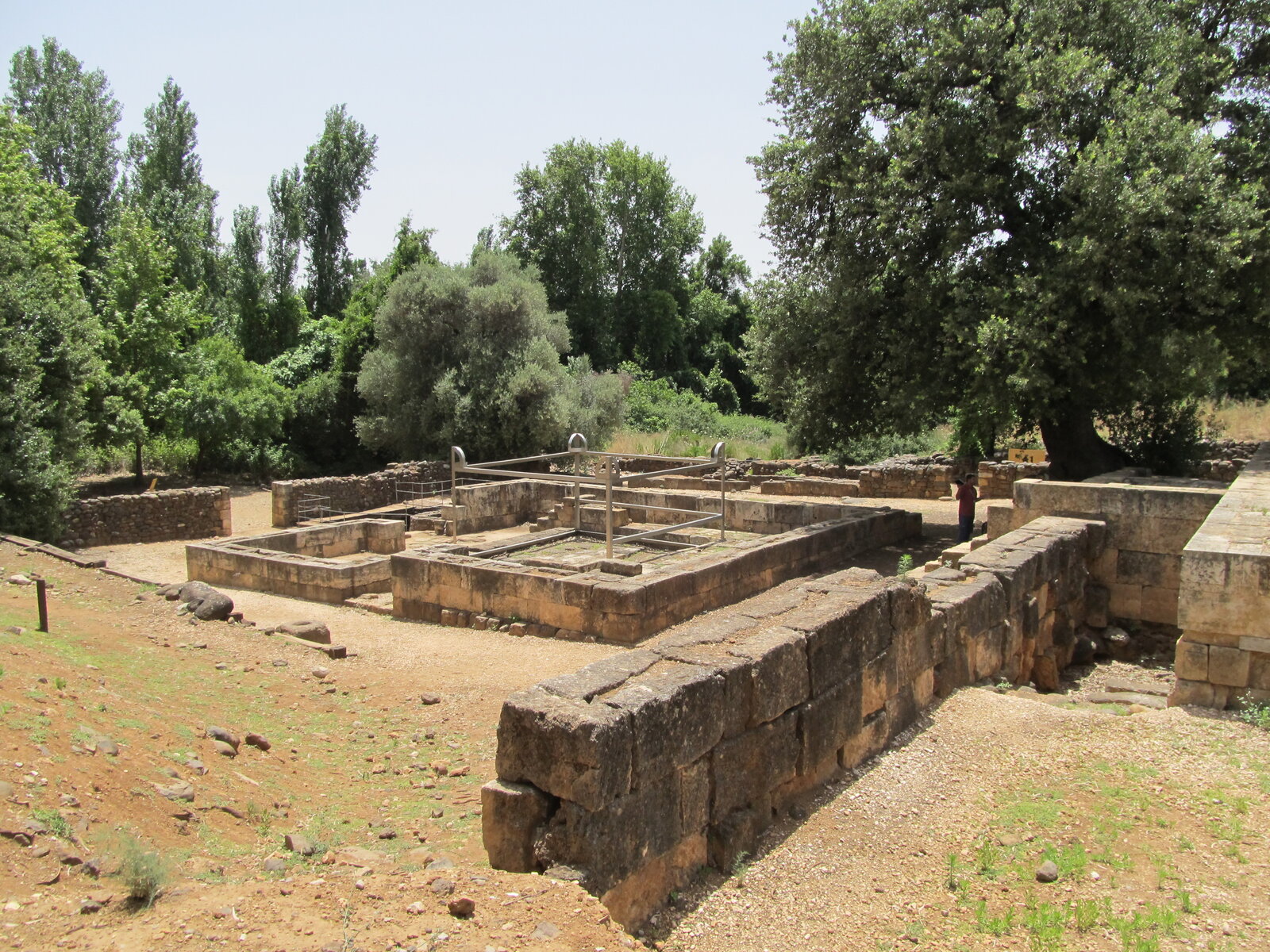 The high place at Tel Dan, site of one of the two Israelite Golden Bull statues mentioned in the Bible. The steel frame marks the reconstructed footprint of the four-horned altar, sized from a surviving horn and the altar’s stone base. Photo by Tamar Marom (תמר מרום) via the PikiWiki Israel free image collection project, CC BY 2.5.
